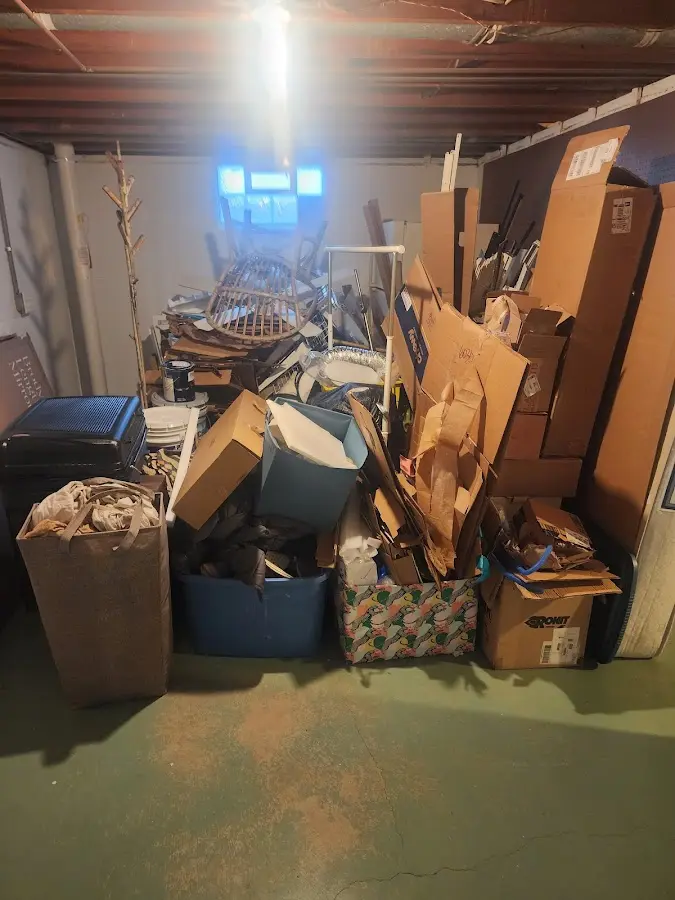 Roll-off dumpster container at job site for 8 Yard Dumpster Rental in Farmington